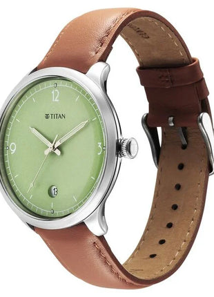 a watch with a green dial and brown leather strap