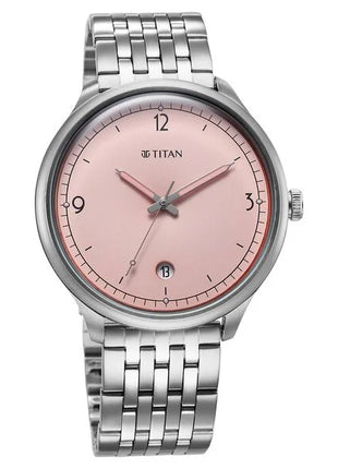 a silver watch with a pink face