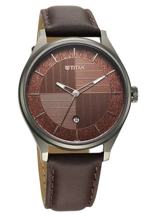 a watch with a brown leather strap