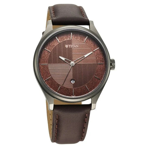 a watch with a brown leather strap