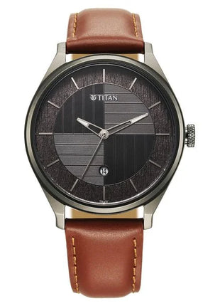 a watch with a brown leather strap