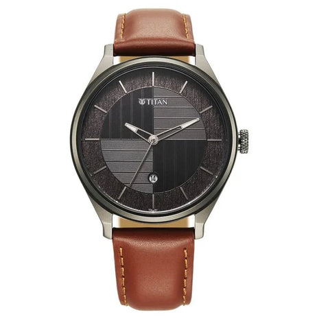 a watch with a brown leather strap