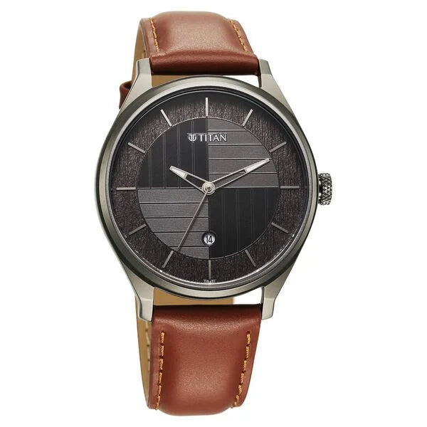 a watch with a brown leather strap