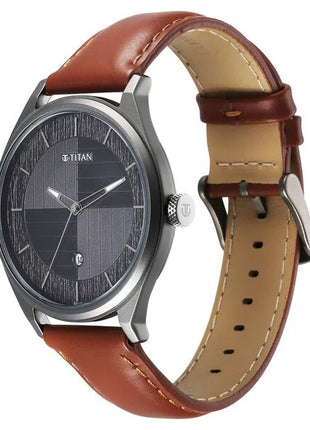 a watch with a brown leather strap