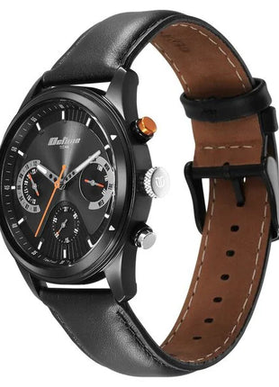 a black watch with a brown leather strap