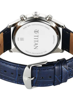 a watch with a blue strap on a white background