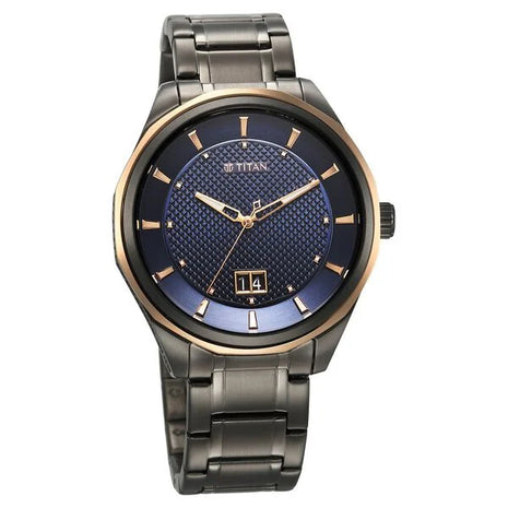 a black and gold watch with a blue dial