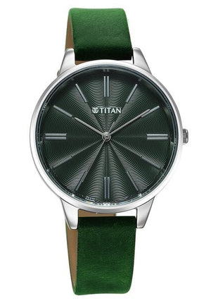 a green watch with a silver case on a white background