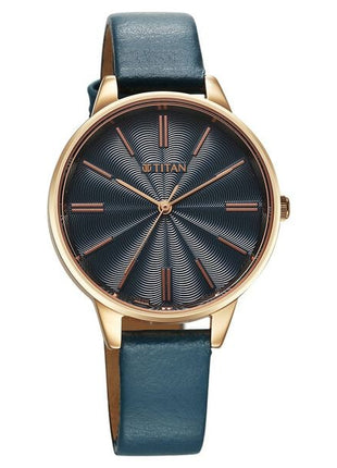 a watch with a blue leather strap