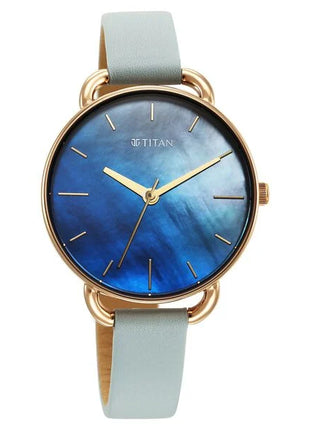 a watch with a blue dial and a gold case