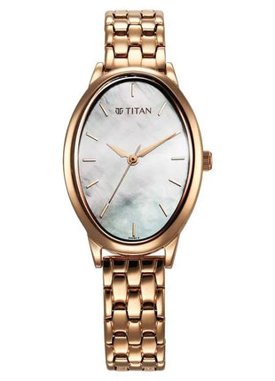 a gold watch with a mother of pearl dial