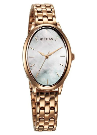 a gold watch with a mother of pearl dial