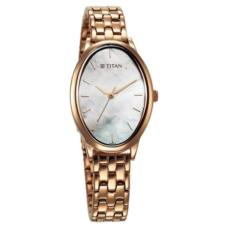 a gold watch with a mother of pearl dial