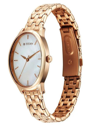 a women's watch with a white dial