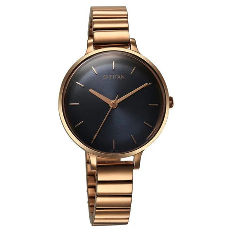 a gold watch with a black face on a white background