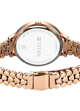 a women's watch with a rose gold bracelet