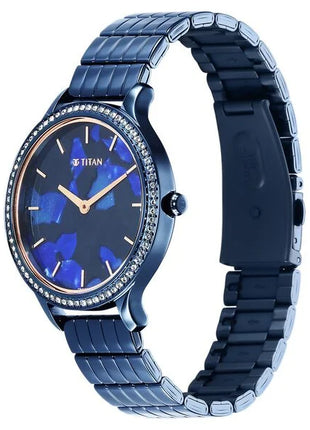 a watch with a blue dial and a blue bracelet