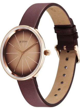 a brown watch with a brown strap