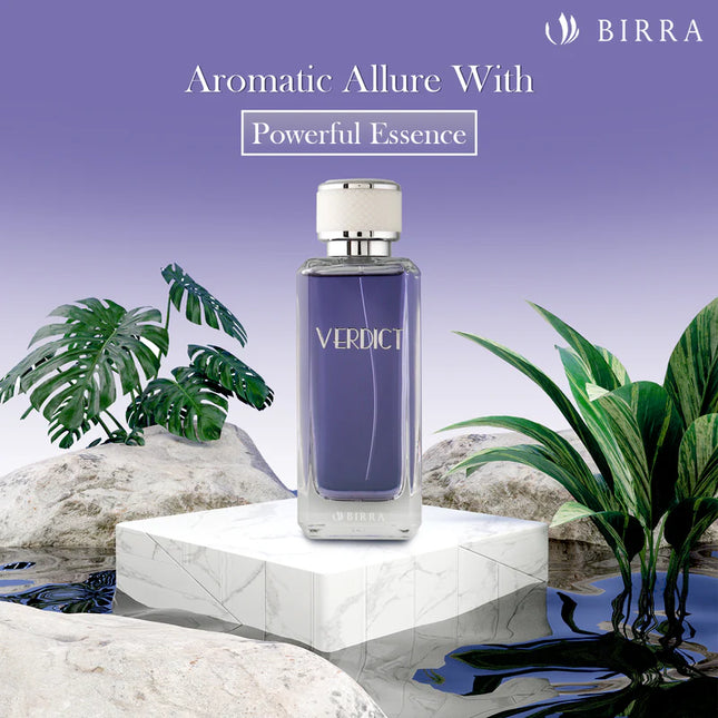 Verdict EDP perfume presented in a stylish setting surrounded by tropical plants and a marble base, emphasizing its aromatic allure and powerful essence.