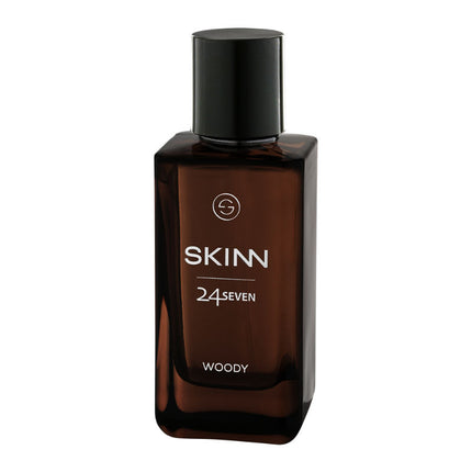 a bottle of skin cologne on a white background