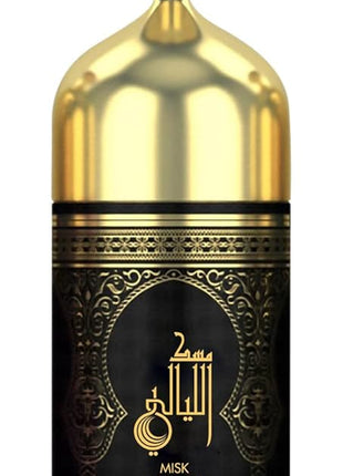 a black and gold canister with arabic writing