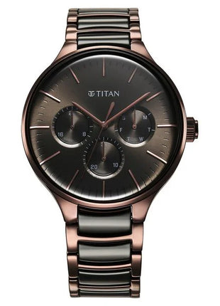 a watch with a black face and a rose gold case