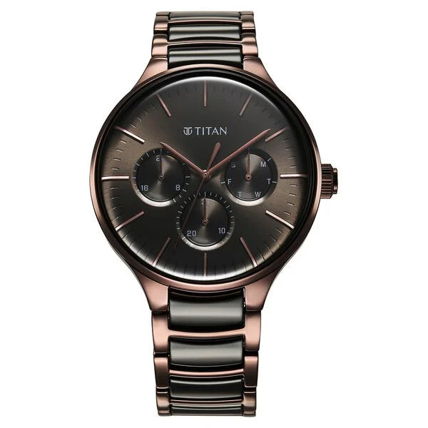 a watch with a black face and a rose gold case