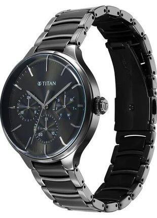 a stainless steel watch with a black dial