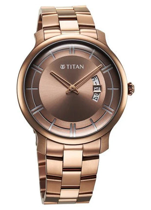 a gold watch with roman numerals on the face