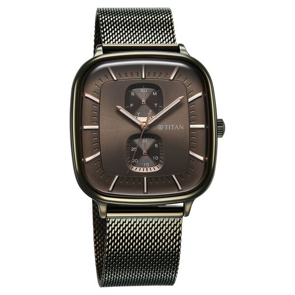 a watch with a black face and a silver mesh strap