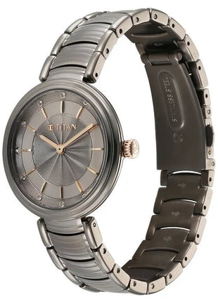 a women's watch with a metal bracelet