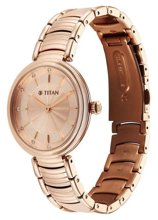 a women's watch with a brown strap