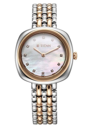 a women's watch with two tone gold and silver bracelets