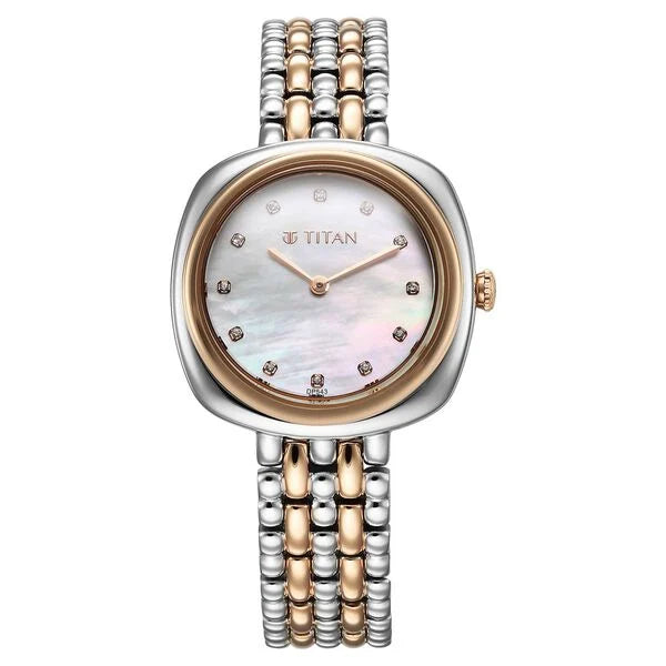 a women's watch with two tone gold and silver bracelets