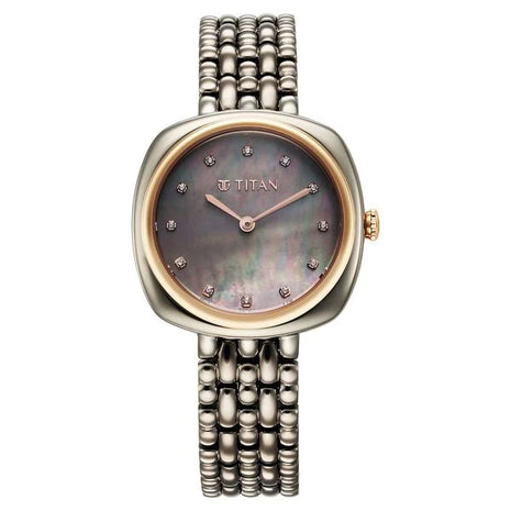 a women's watch with a mother of pearl dial