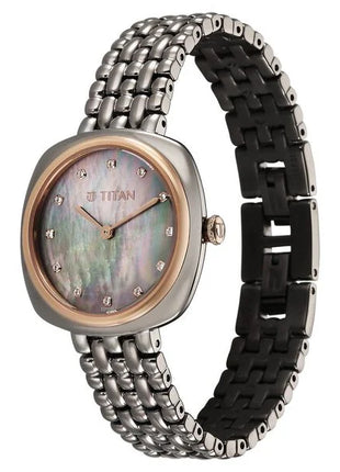 a women's watch with a mother of pearl dial