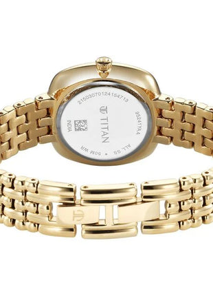 a women's watch with a gold bracelet