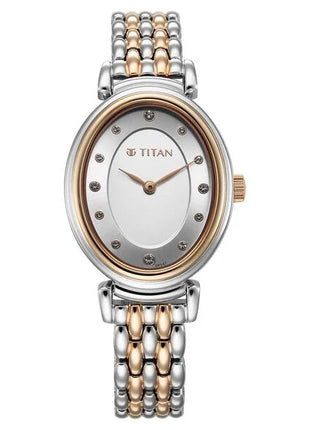 a women's watch with two tone gold and silver bracelets