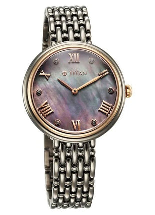 a women's watch with roman numerals