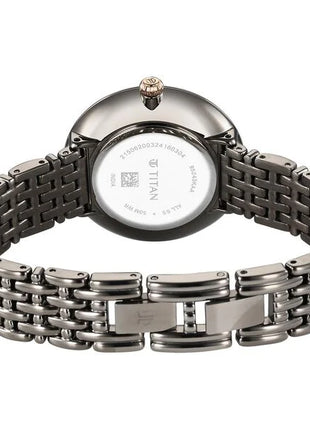 a close up of a watch on a bracelet