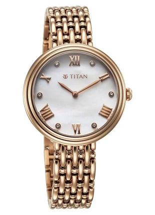 a women's watch with a white dial