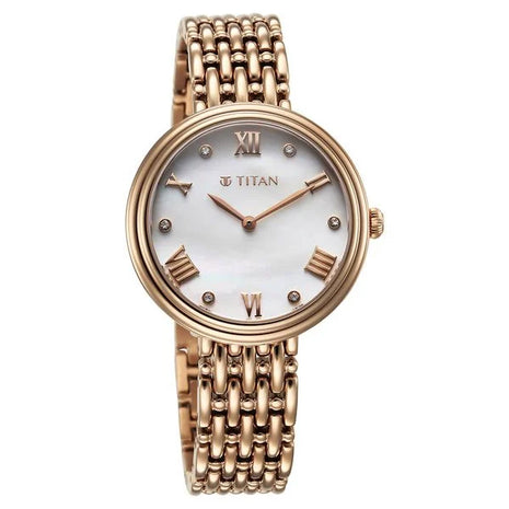 a women's watch with a white dial