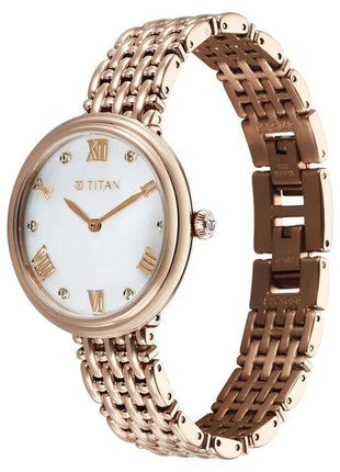 a women's watch with a white dial