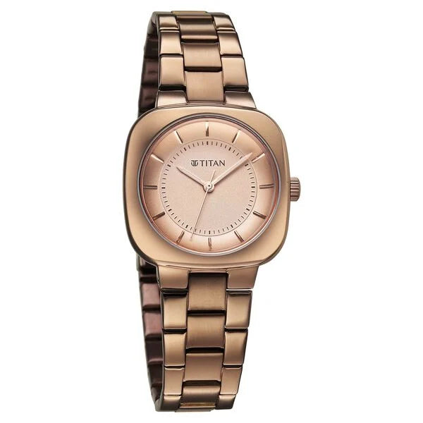 a women's watch with a pink dial