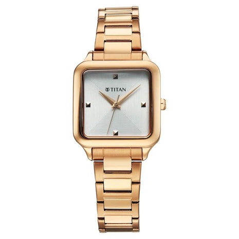 a women's watch with a gold bracelet