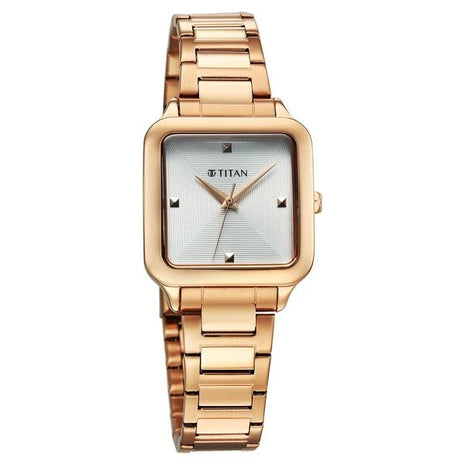 a women's watch with a gold bracelet