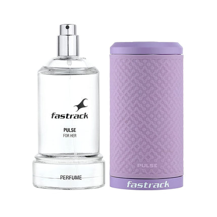 a bottle of perfume next to a canister