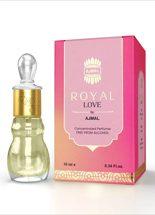 a bottle of royal love perfume next to a box