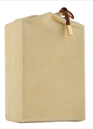 a bag with a tag on it that says club de nuit