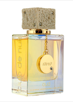 a bottle of perfume with a cork top on a white background